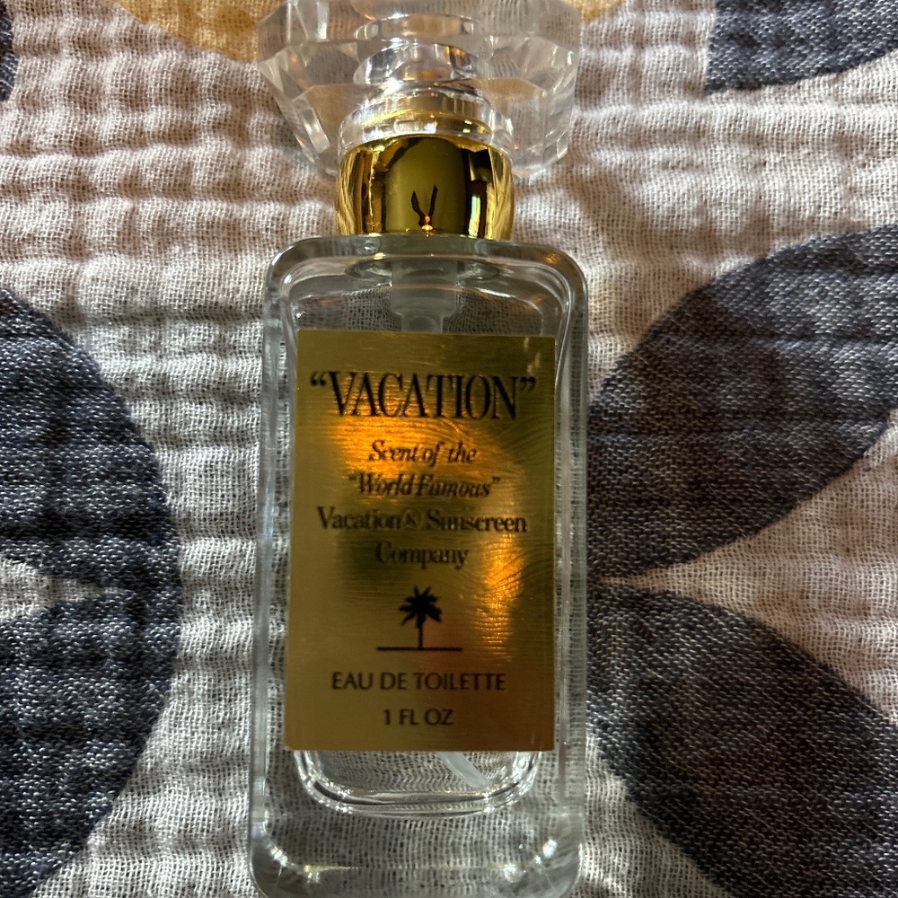 Vacation eau de toilette 1 ounce bottle 2/3 full
